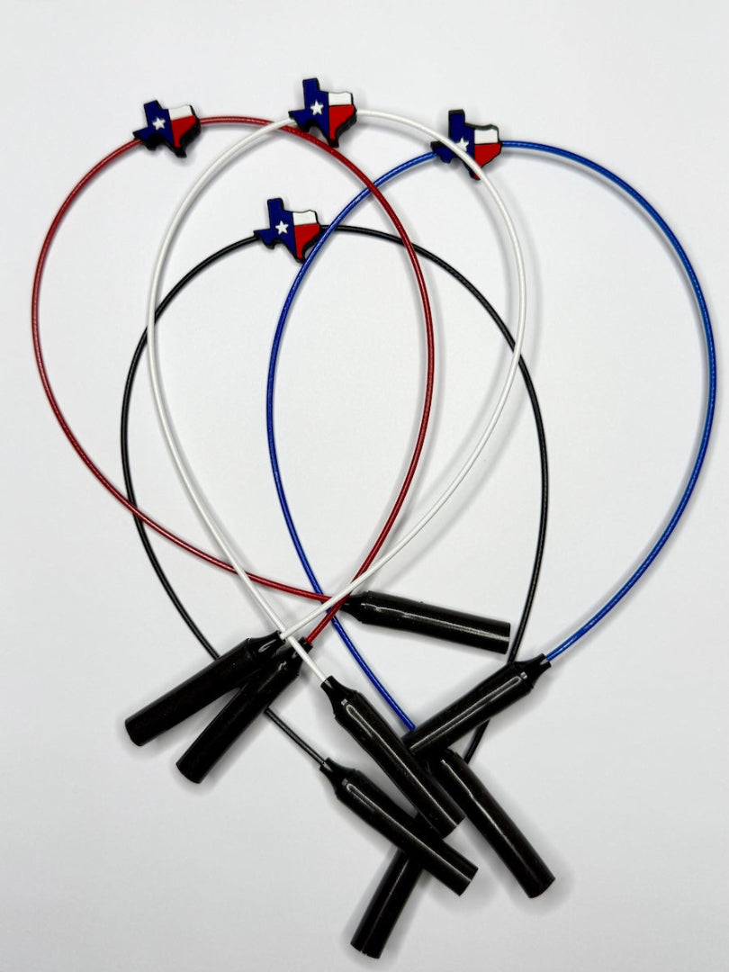Pairs of GRAPLRZ The TX in white, red, black, and blue stacked on top of each other over a white background